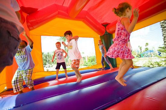 Kids bouncing in a bounce house
